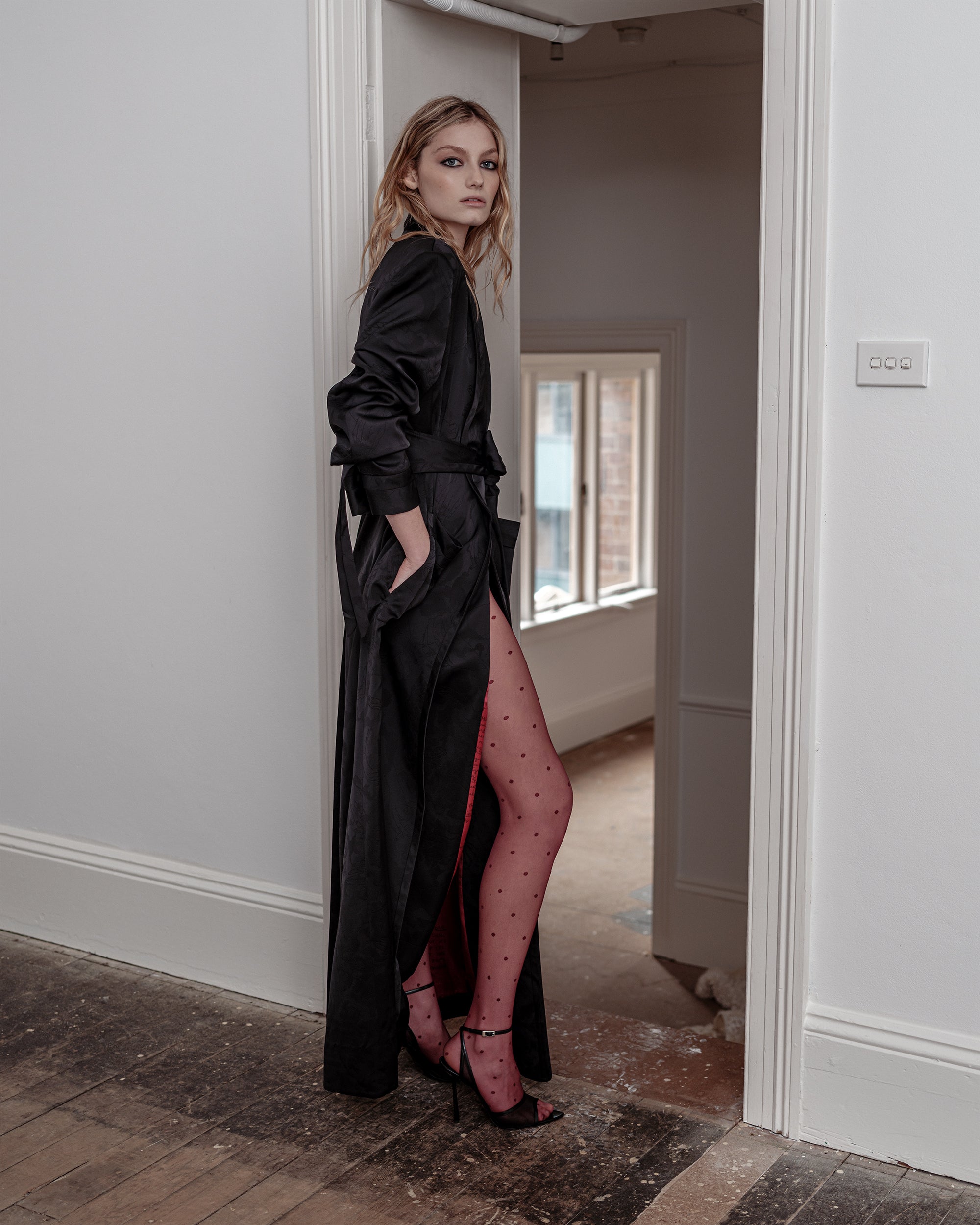 Blong woman wearing black silk dress Humbug from Common Hours.