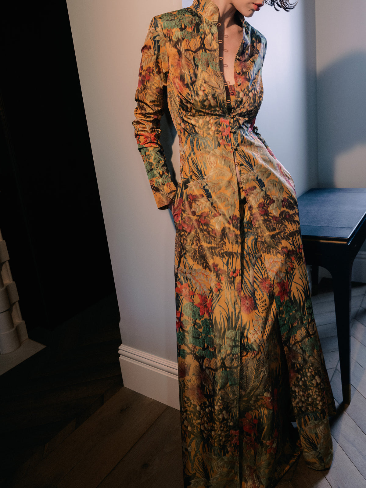 The Rapture Coat. Common Hours x Abbey Lee collection floor-length coat crafted from a bespoke floral silk-blend jacquard