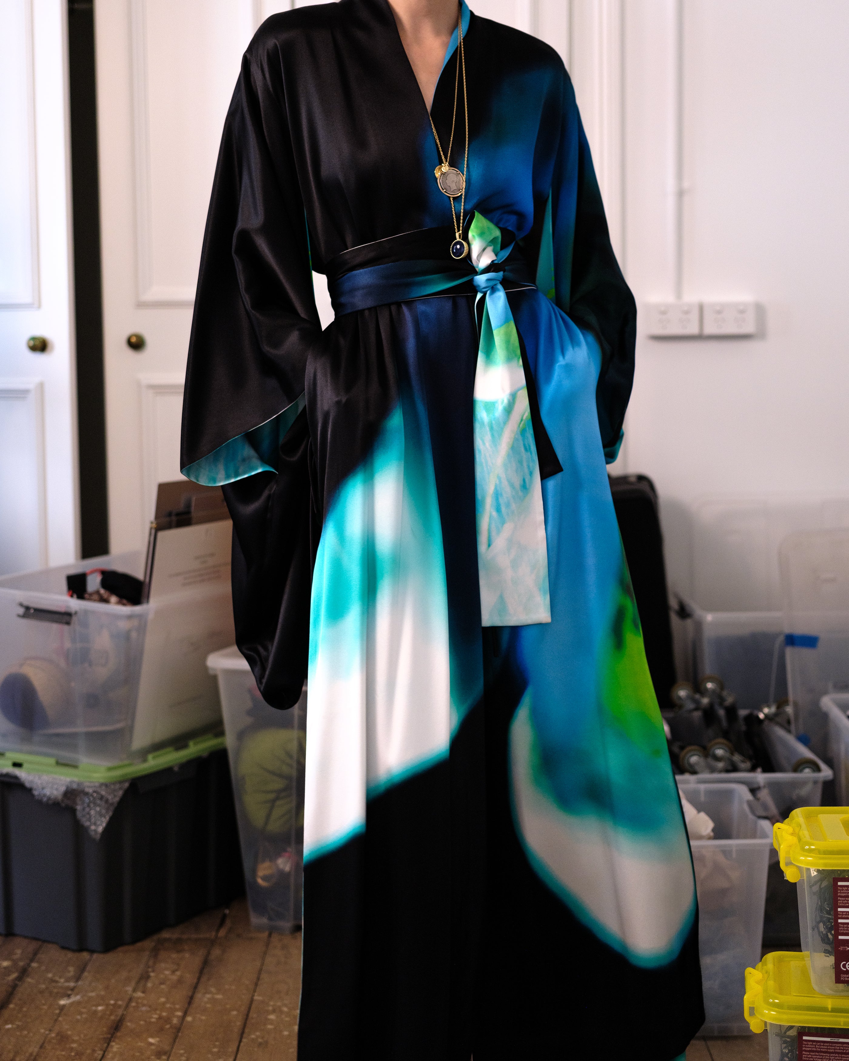 Woman wearing a Common Hours Iceberg Reversible Silk Dress