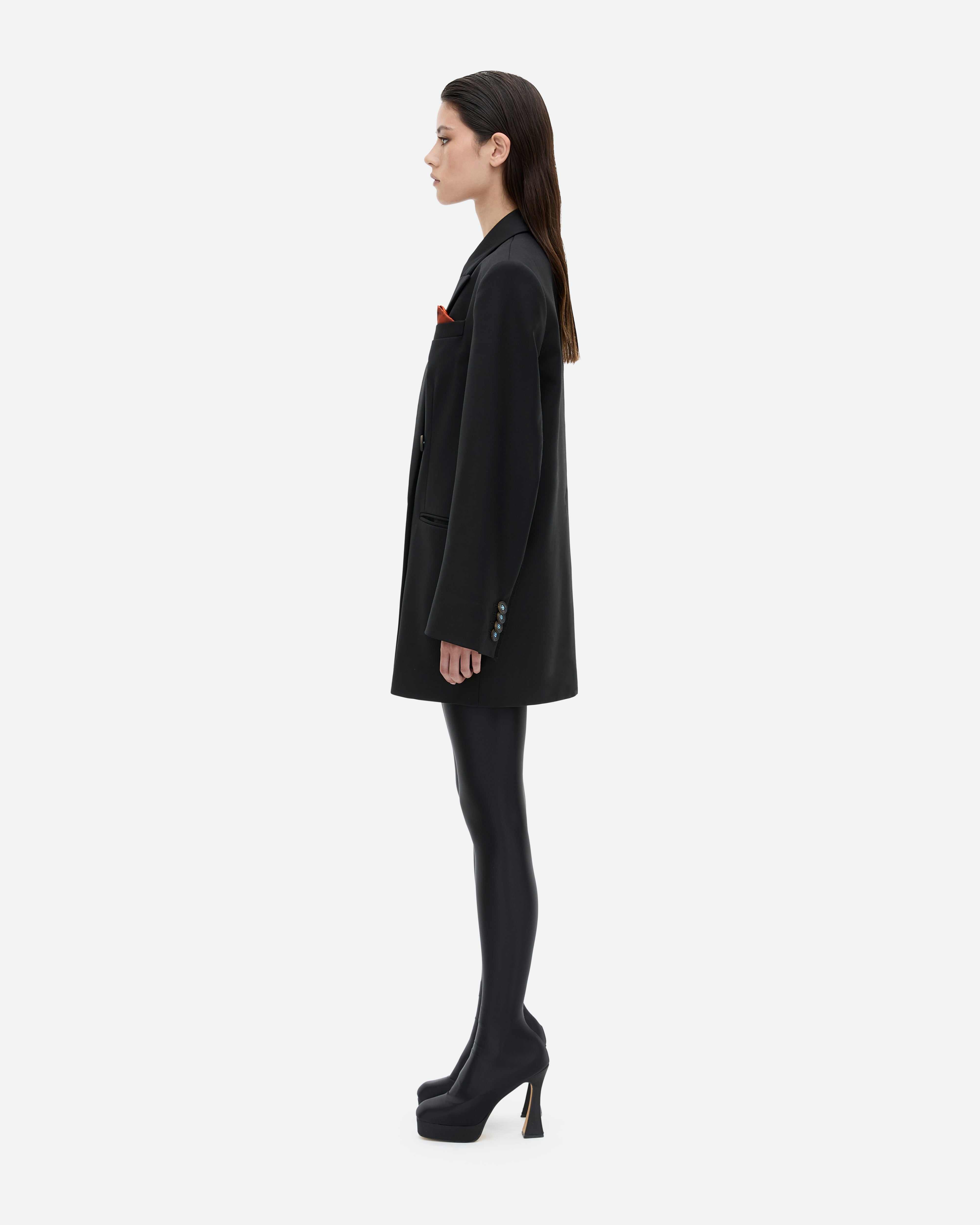 Black blazer jacket Pretender dress with a red silk pocket square from Common Hours.