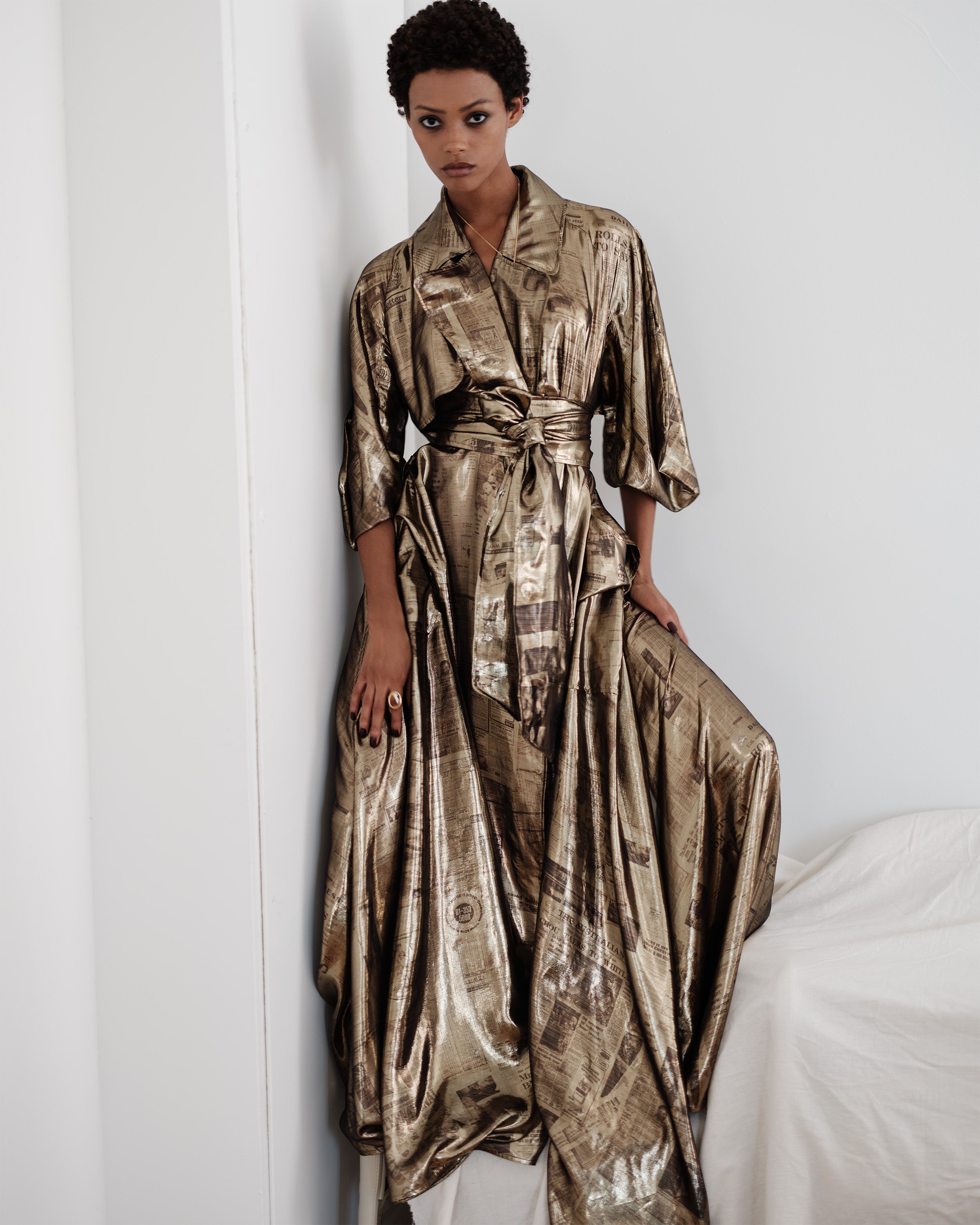 Gold newsletter print trench coat dress, Headline dress by Common Hours.